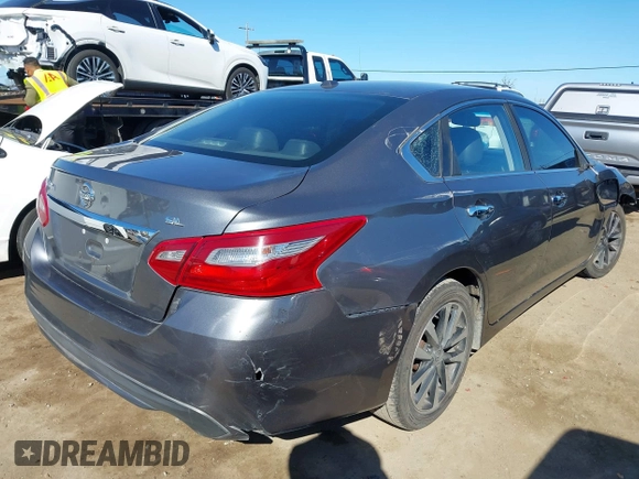 2018 Nissan Altima SR with VIN 1N4AL3AP0JC244794, listed as a IAAI auction lot 41677399 with 185,216 mi miles and . Bid and sale history available at DreamBid. Image 4.
