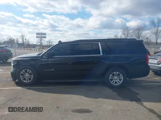 2016 Chevrolet Suburban LT z VIN 1GNSKHKC9GR170105, wystawiony jako IAAI lot #41533435 z przebiegiem 141 278 mil mil oraz . Historia ofert i sprzedaży dostępna na DreamBid. Obrazek 14.