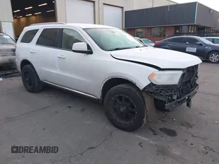 2015 Dodge Durango SXT with VIN 1C4RDJAG1FC745974, listed as a IAAI auction lot 41392820 with 124,861 mi miles and . Bid and sale history available at DreamBid. Image 1.