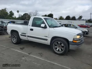 2002 Chevrolet Silverado 1500 LS with VIN 1GCEC14V02Z217975, listed as a Copart auction lot 43247135 with 205,623 mi miles and Salvage Title. Bid and sale history available at carsss.com. Image 4.