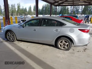 2017 Mazda Mazda6 Touring with VIN JM1GL1V50H1144637, listed as a IAAI auction lot 41849569 with 100,047 mi miles. Bid and sale history available at carsss.com. Image 14.