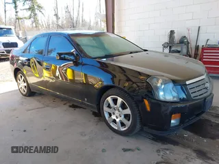 2006 Cadillac CTS with VIN 1G6DP577360126880, listed as a IAAI auction lot 41529325 with 137,656 mi miles. Bid and sale history available at carsss.com. Image 1.