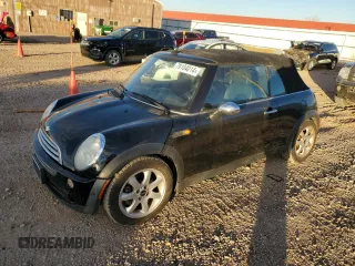 2007 MINI Convertible with VIN WMWRF33597TG16707, listed as a Copart auction lot 79104014 with 113,380 mi miles and Salvage Title. Bid and sale history available at DreamBid. Image 1.