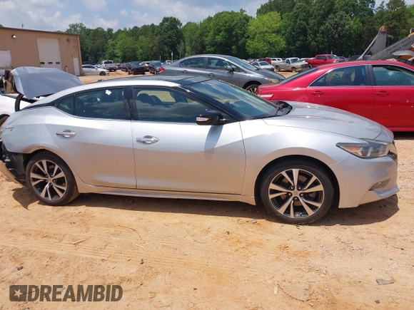 2016 Nissan Maxima SR with VIN 1N4AA6AP7GC389606, listed as a IAAI auction lot 42451614 with 114,957 mi miles and . Bid and sale history available at DreamBid. Image 13.