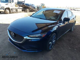 2020 Mazda Mazda6 Touring with VIN JM1GL1VM2L1514941, listed as a IAAI auction lot 41831353 with 154,033 mi miles. Bid and sale history available at carsss.com. Image 2.