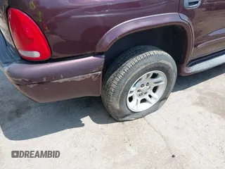 2003 Dodge Durango SLT Plus z VIN 1D4HS58N03F586049, wystawiony jako IAAI lot #42154236 z przebiegiem 253 727 mil mil oraz . Historia ofert i sprzedaży dostępna na DreamBid. Obrazek 6.
