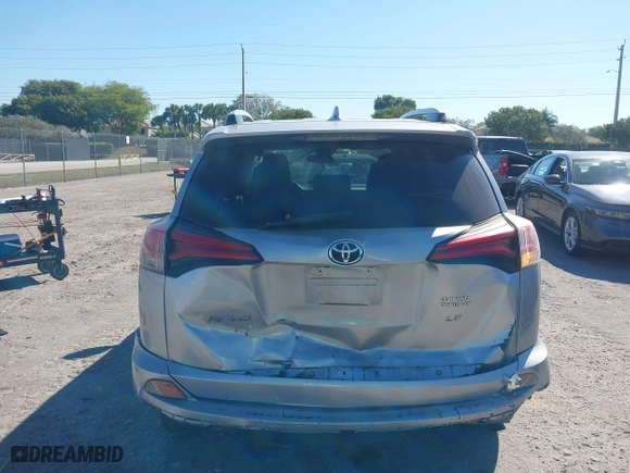 2018 Toyota RAV4 LE with VIN JTMZFREVXJJ196183, listed as a IAAI auction lot 41776107 with 82,713 mi miles. Bid and sale history available at carsss.com. Image 17.