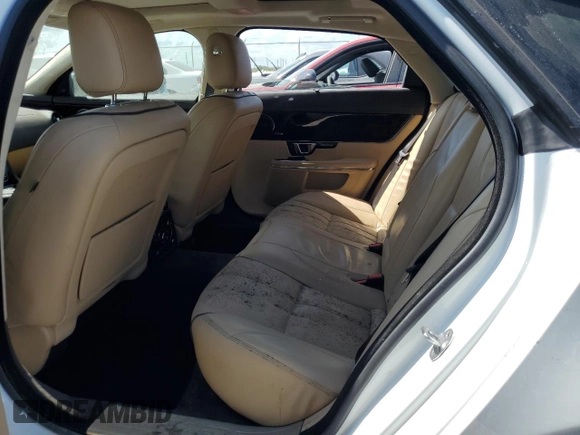 2014 Jaguar XJ Portfolio with VIN SAJWJ2GD6E8V74284, listed as a Copart auction lot 74577584 with 39,835 mi miles and Non repairable. Bid and sale history available at DreamBid. Image 10.