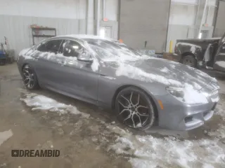 2013 BMW 6 Series 650i with VIN WBA6B2C53DDG66730, listed as a Copart auction lot 45125875 with 138,362 mi miles and Clean Title. Bid and sale history available at DreamBid. Image 4.