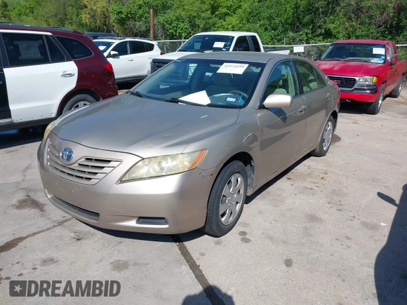 2009 Toyota Camry with VIN 4T1BE46K09U854188, listed as a IAAI auction lot 41973199 with 210,924 mi miles. Bid and sale history available at carsss.com. Image 2.