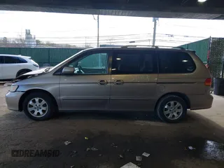 2004 Honda Odyssey EX-RES z VIN 5FNRL18874B127785, wystawiony jako IAAI lot #41141221 z przebiegiem 151 036 mil mil oraz . Historia ofert i sprzedaży dostępna na DreamBid. Obrazek 14.