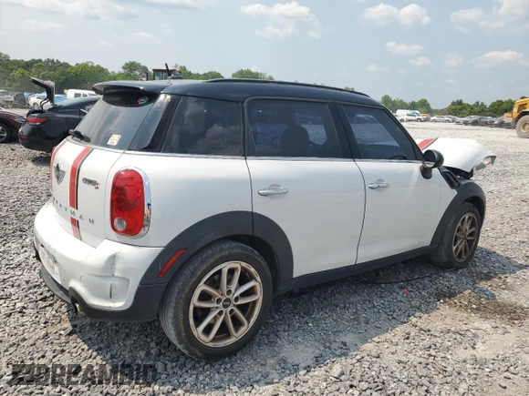 2015 MINI Countryman S with VIN WMWZC3C55FWT03267, listed as a Copart auction lot 59331605 with 116,964 mi miles and Salvage title. Bid and sale history available at DreamBid. Image 3.