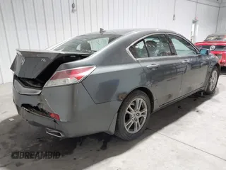 2009 Acura TL Tech with VIN 19UUA86559A006482, listed as a IAAI auction lot 41531597 with 203,255 mi miles. Bid and sale history available at carsss.com. Image 4.