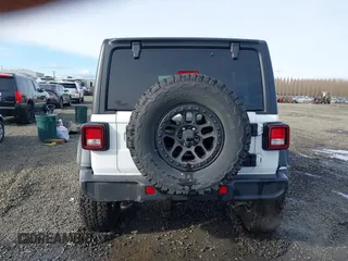2023 Jeep Wrangler Sport with VIN 1C4HJXDG4PW567027, listed as a IAAI auction lot 41633197 with 14,782 mi miles and . Bid and sale history available at DreamBid. Image 17.