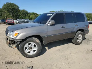 1998 Lexus LX 470 with VIN JT6HT00W6W0002396, listed as a Copart auction lot 75092884 with 257,996 mi miles and Salvage Title. Bid and sale history available at DreamBid. Image 1.