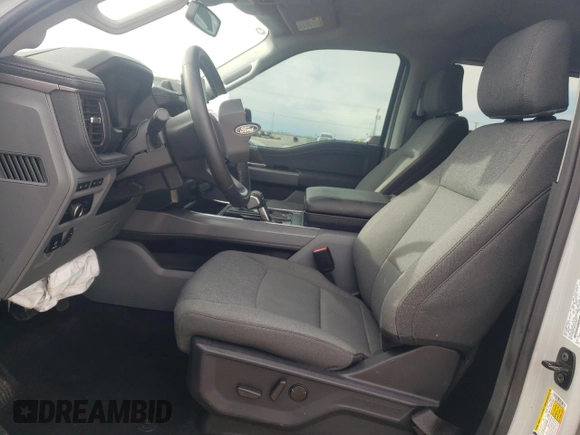 2024 Ford F-150 Lightning Flash с VIN 1FT6W3L78RWG28675, выставлен на аукционе Copart как лот 54061285 с пробегом 11 867 миль миль и Списание • Salvage title. История ставок и продаж доступна на DreamBid. Изображение 7.