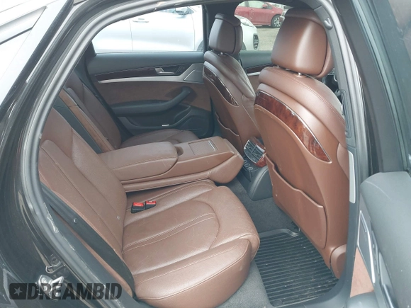 2012 Audi A8 с VIN WAUAVAFD0CN035731, выставлен на аукционе IAAI как лот 41286022 с пробегом 82 835 миль миль и . История ставок и продаж доступна на DreamBid. Изображение 8.