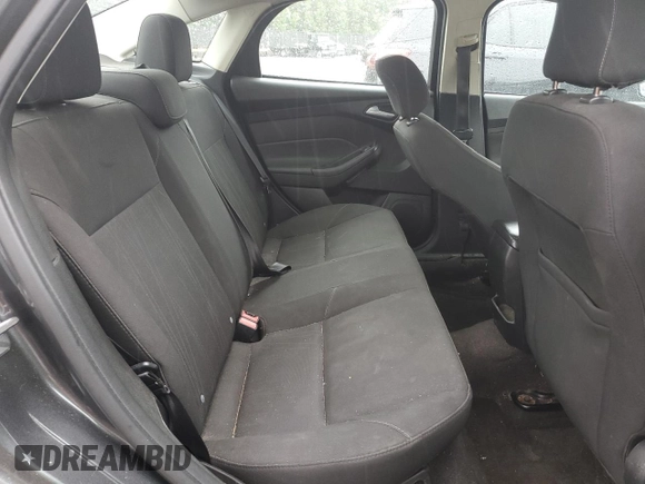 2018 Ford Focus SE z VIN 1FADP3F21JL285417, wystawiony jako Copart lot #56936965 z przebiegiem Nie podano mil oraz Czysty tytuł • Clean title. Historia ofert i sprzedaży dostępna na DreamBid. Obrazek 10.