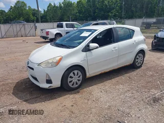 2012 Toyota Prius One z VIN JTDKDTB36C1009273, wystawiony jako IAAI lot #42454213 z przebiegiem 227 913 mil mil oraz . Historia ofert i sprzedaży dostępna na DreamBid. Obrazek 2.