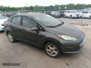 2015 Ford Fiesta SE with VIN 3FADP4BJ8FM178485, listed as a IAAI auction lot 42095511 with 151,064 mi miles. Bid and sale history available at carsss.com. Image 1.