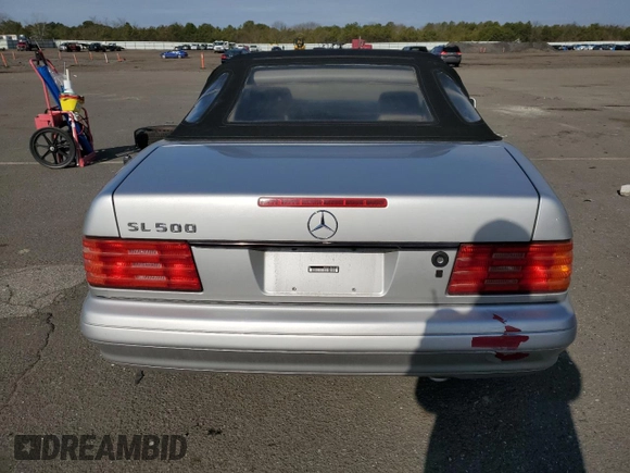 1997 Mercedes-Benz SL-Class with VIN WDBFA67F6VF141307, listed as a Copart auction lot 52554515 with 94,913 mi miles and Salvage Title. Bid and sale history available at carsss.com. Image 6.