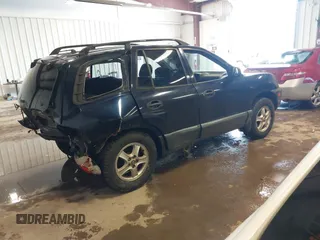 2004 Hyundai Santa Fe GLS with VIN KM8SC73D84U833286, listed as a IAAI auction lot 41644780 with 160,313 mi miles. Bid and sale history available at carsss.com. Image 4.