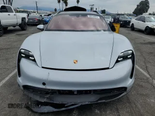 2023 Porsche Taycan 4 with VIN WP0BA2Y13PSA60032, listed as a Copart auction lot 68658963 with 4,572 mi miles and . Bid and sale history available at DreamBid. Image 5.