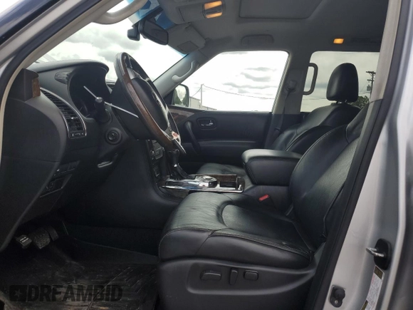 2016 Infiniti QX80 with VIN JN8AZ2NF5G9610490, listed as a Copart auction lot 60041325 with 131,253 mi miles and Salvage title. Bid and sale history available at DreamBid. Image 7.