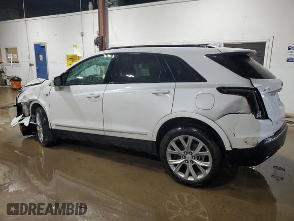 2021 Cadillac XT5 AWD Sport with VIN 1GYKNGRS5MZ142444, listed as a Copart auction lot 54502285 with 27,070 mi miles and Salvage title. Bid and sale history available at DreamBid. Image 2.