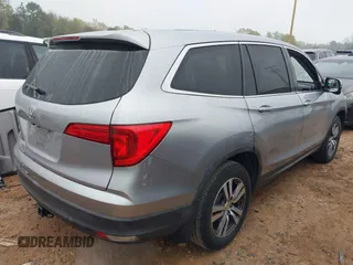 2018 Honda Pilot EX-L with VIN 5FNYF5H50JB022680, listed as a IAAI auction lot 41919787 with 159,205 mi miles and . Bid and sale history available at DreamBid. Image 4.