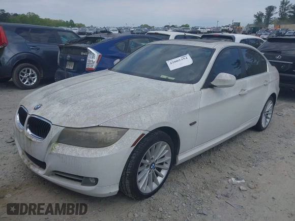 2011 BMW 3 Series 335i with VIN WBAPM5C51BE575704, listed as a IAAI auction lot 42005354 with 205,263 mi miles. Bid and sale history available at carsss.com. Image 17.