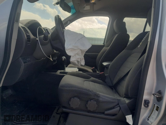 2016 Nissan Frontier S with VIN 1N6AD0EV8GN721786, listed as a Copart auction lot 54417415 with 100,672 mi miles and Salvage title. Bid and sale history available at DreamBid. Image 7.