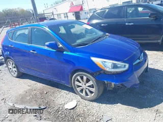 2014 Hyundai Accent SE with VIN KMHCU5AE7EU145783, listed as a IAAI auction lot 41885735 with 140,255 mi miles. Bid and sale history available at carsss.com. Image 1.