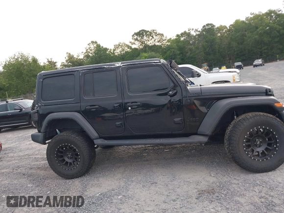 2021 Jeep Wrangler Unlimited Willys z VIN 1C4HJXDM5MW859724, wystawiony jako IAAI lot #42311203 z przebiegiem 71 887 mil mil oraz . Historia ofert i sprzedaży dostępna na DreamBid. Obrazek 13.
