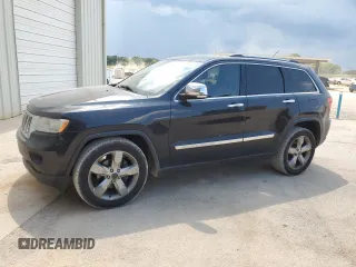 2013 Jeep Grand Cherokee Overland with VIN 1C4RJECT7DC526119, listed as a Copart auction lot 60735594 with 143,454 mi miles and Clean Title. Bid and sale history available at carsss.com. Image 1.
