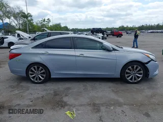 2012 Hyundai Sonata SE with VIN 5NPEC4AB9CH475853, listed as a IAAI auction lot 42084329 with 143,146 mi miles and . Bid and sale history available at carsss.com. Image 14.