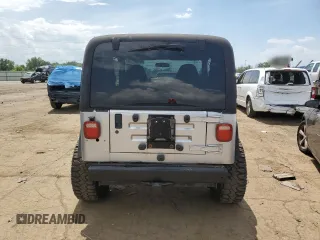 2002 Jeep Wrangler X с VIN 1J4FA39S52P770423, выставлен на аукционе Copart как лот 62498885 с пробегом 87 433 миль миль и Чистый • Clean title. История ставок и продаж доступна на DreamBid. Изображение 6.