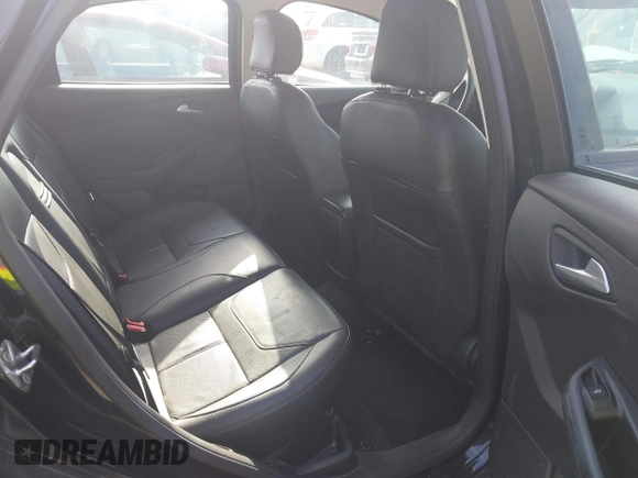 2015 Ford Focus SE with VIN 1FADP3F29FL384591, listed as a IAAI auction lot 42537981 with 49,735 mi miles and . Bid and sale history available at DreamBid. Image 8.