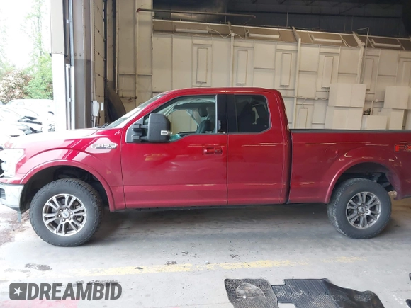 2019 Ford F-150 XL with VIN 1FTFX1E46KKC60997, listed as a IAAI auction lot 42147634 with 99,878 mi miles and . Bid and sale history available at DreamBid. Image 13.