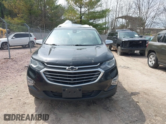2019 Chevrolet Equinox Premier z VIN 2GNAXYEX5K6143922, wystawiony jako IAAI lot #42134219 z przebiegiem 105 496 mil mil oraz . Historia ofert i sprzedaży dostępna na DreamBid. Obrazek 12.