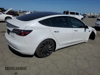 2021 Tesla Model 3 Performance with VIN 5YJ3E1EC5MF077493, listed as a Copart auction lot 48067045 with 44,285 mi miles and Salvage Title. Bid and sale history available at DreamBid. Image 3.