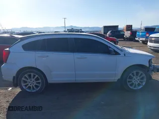 2011 Dodge Caliber Heat with VIN 1B3CB5HA5BD249182, listed as a IAAI auction lot 41831735 with 98,491 mi miles and . Bid and sale history available at DreamBid. Image 14.