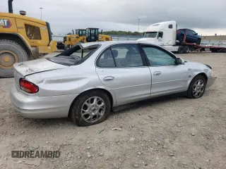 2000 Oldsmobile Intrigue GLS z VIN 1G3WX52H0YF233648, wystawiony jako Copart lot #72619824 z przebiegiem Nie podano mil oraz Nie do naprawy. Historia ofert i sprzedaży dostępna na DreamBid. Obrazek 3.