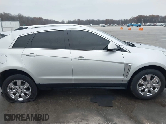 2016 Cadillac SRX Luxury Collection with VIN 3GYFNBE39GS550952, listed as a IAAI auction lot 40921325 with 90,160 mi miles. Bid and sale history available at carsss.com. Image 13.