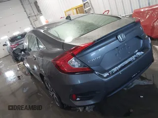 2018 Honda Civic EX-T with VIN JHMFC1F35JX031132, listed as a IAAI auction lot 41591028 with 111,087 mi miles and . Bid and sale history available at DreamBid. Image 3.