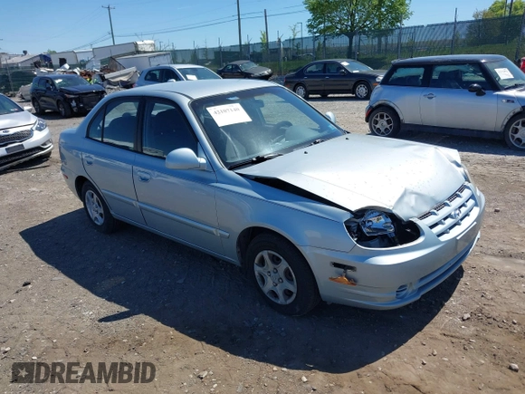 2005 Hyundai Accent GLS with VIN KMHCG45C75U658672, listed as a IAAI auction lot 42107140 with 34,351 mi miles. Bid and sale history available at carsss.com. Image 1.