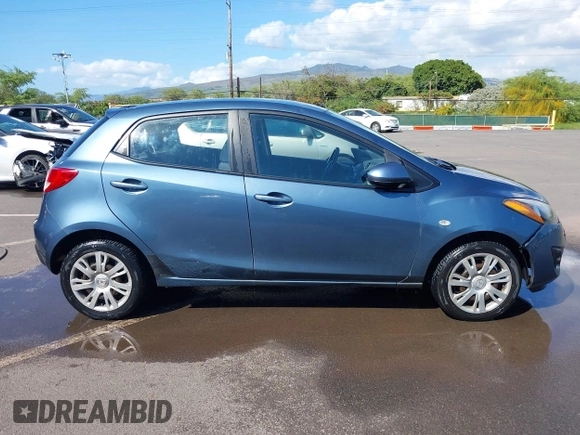 2014 Mazda 2 Sport with VIN JM1DE1KY0E0181555, listed as a IAAI auction lot 41539841 with 121,918 mi miles and . Bid and sale history available at DreamBid. Image 13.