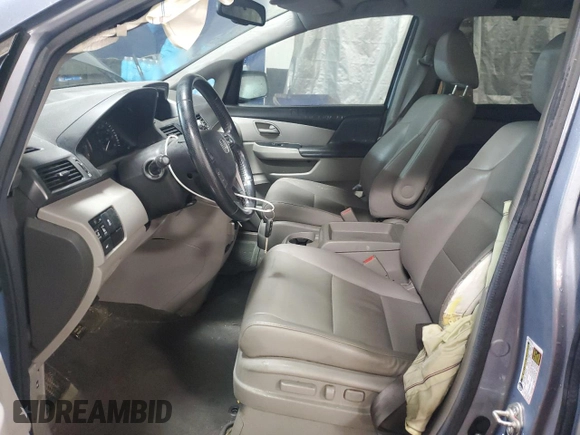 2013 Honda Odyssey EX-L with VIN 5FNRL5H64DB080141, listed as a Copart auction lot 49553235 with 128,358 mi miles and Salvage Title. Bid and sale history available at carsss.com. Image 7.