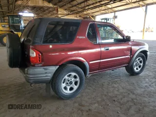 2002 Isuzu Rodeo z VIN 4S2CK57D924300875, wystawiony jako Copart lot #76639584 z przebiegiem 142 122 mil mil oraz Szkody całkowita. Historia ofert i sprzedaży dostępna na DreamBid. Obrazek 3.