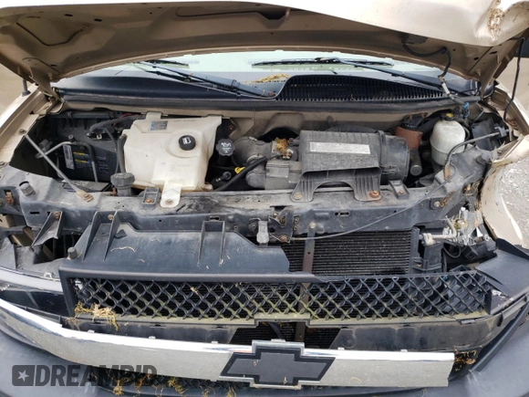 2006 Chevrolet Express Passenger с VIN 1GNFG15T961223498, выставлен на аукционе Copart как лот 45679095 с пробегом 191 266 миль миль и Списание • Salvage title. История ставок и продаж доступна на DreamBid. Изображение 12.